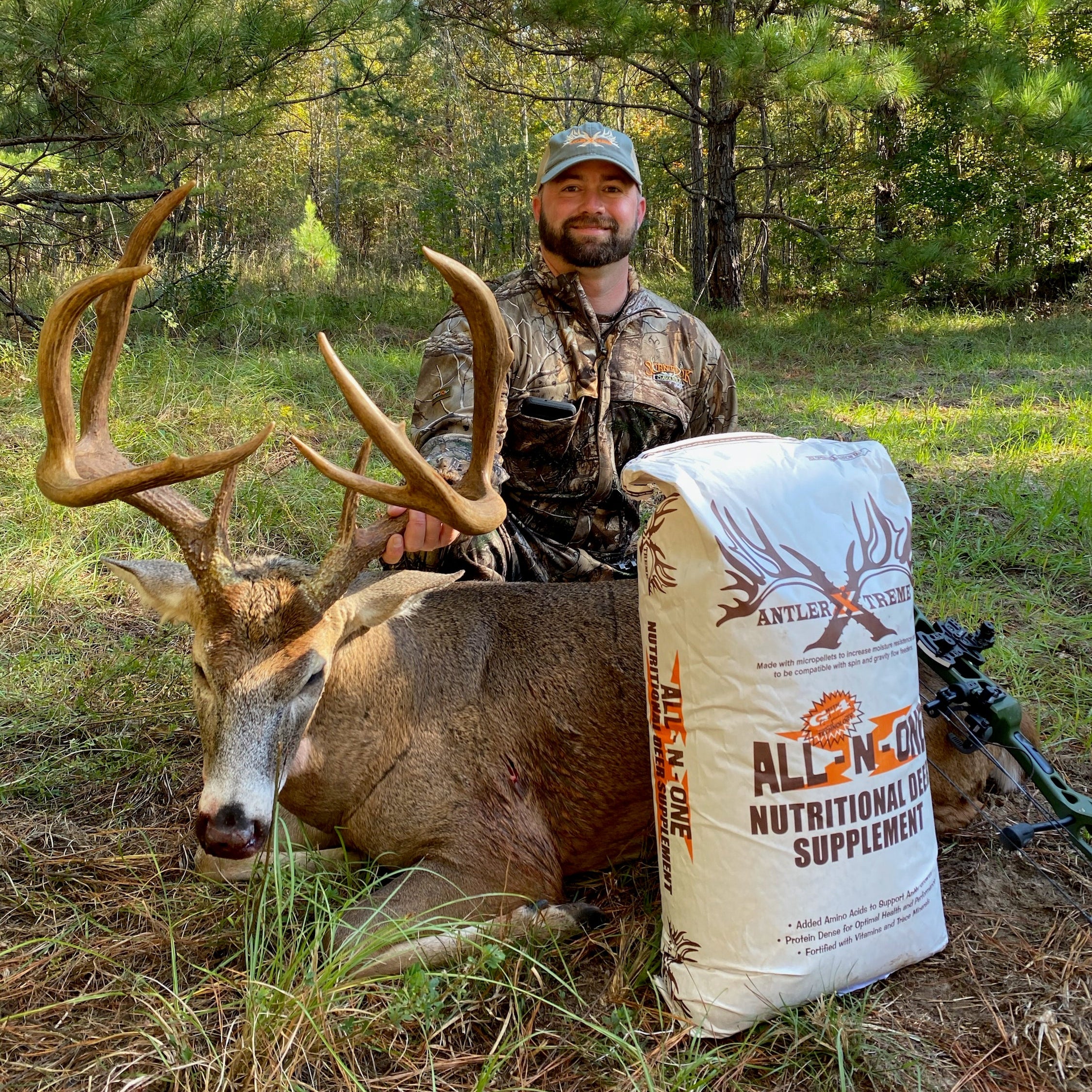 Jody Chance with mature whitetail deer grown using AntlerXtreme feed in Georgia