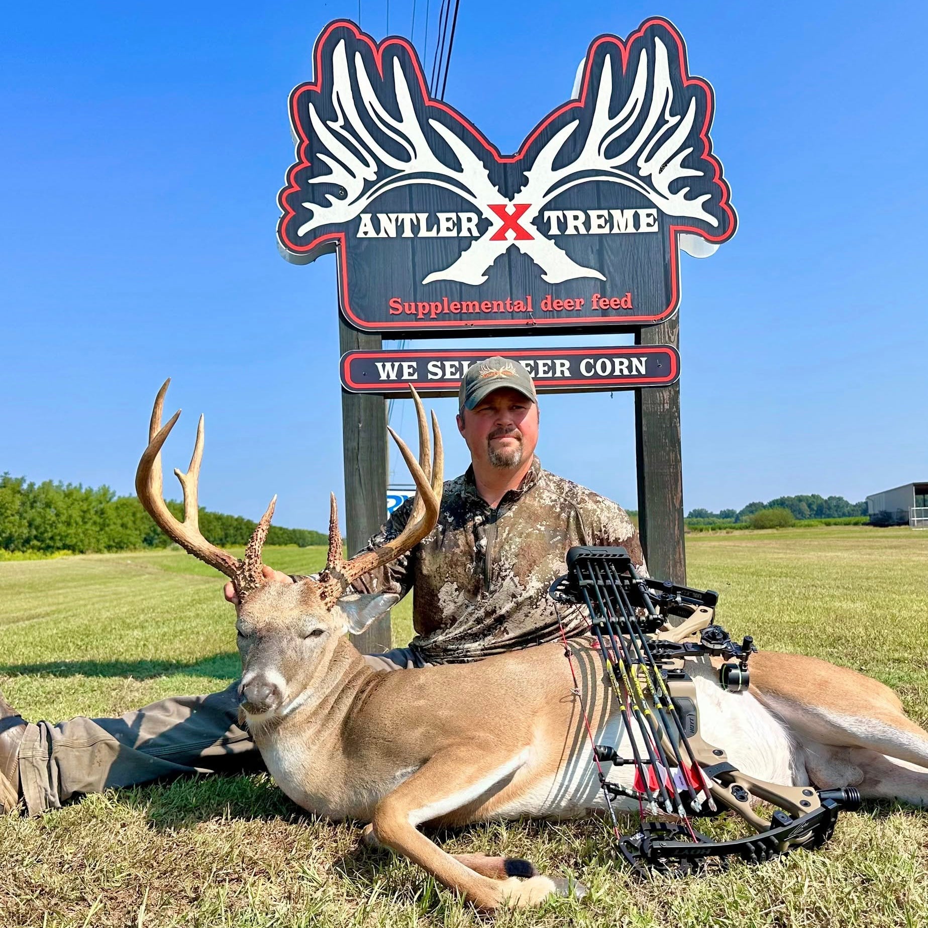 John Nadolny with Alabama whitetail deer patterned using AntlerXtreme feed